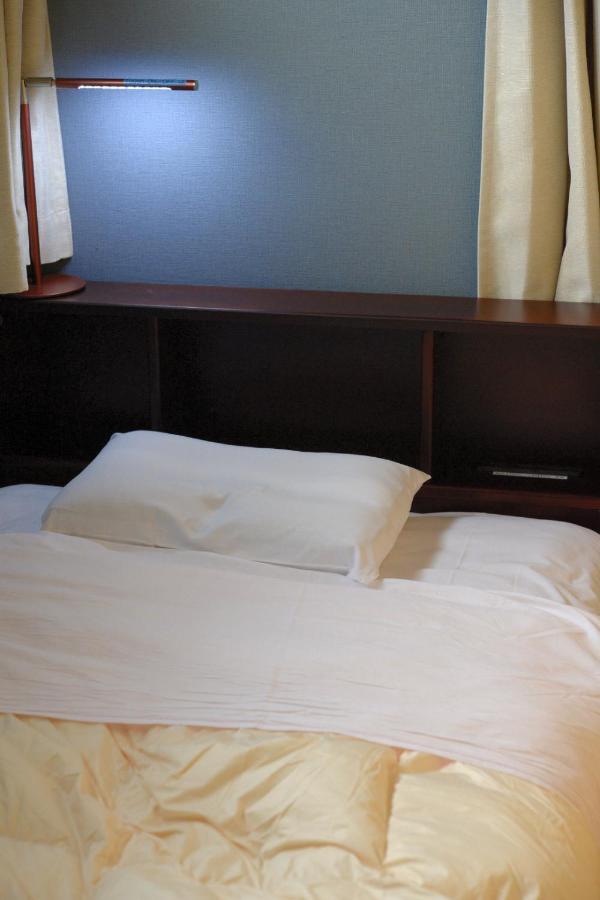 Guesthouse Iwase Toyama Station Exterior foto