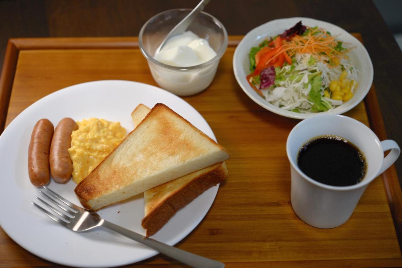 Guesthouse Iwase Toyama Station Exterior foto