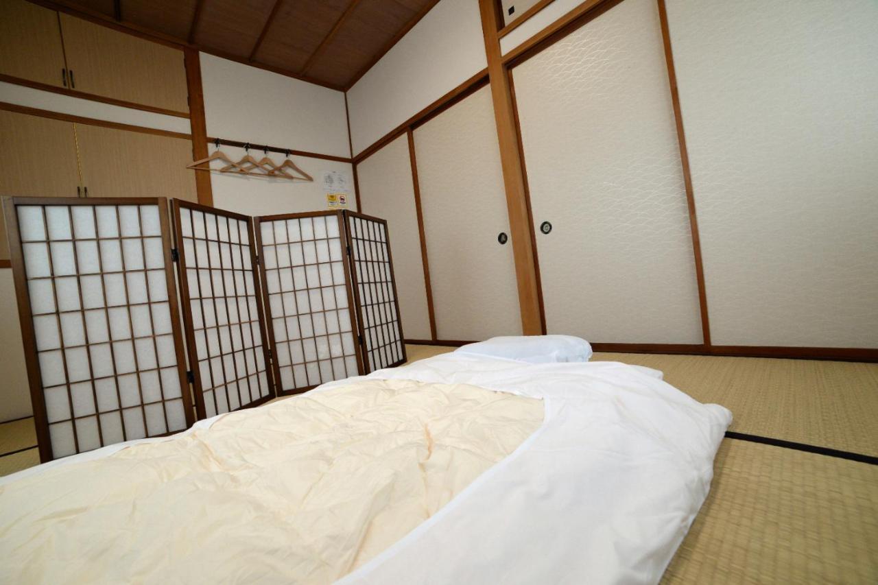 Guesthouse Iwase Toyama Station Exterior foto